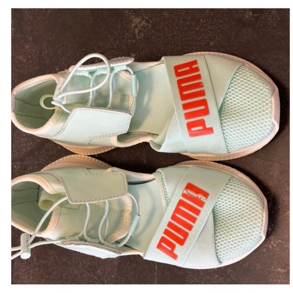 Junior size (5.5) Puma sneakers, mint green and orange.